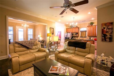 The Family room opens to the kitchen, the gatherin