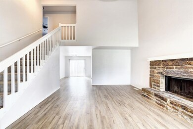Unfurnished living room with light wood-type floor