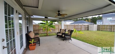 Huge rear porch with remote controlled retractable