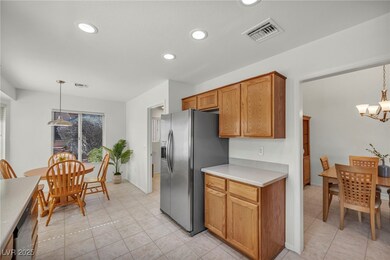 Kitchen featuring light countertops, stainless ste