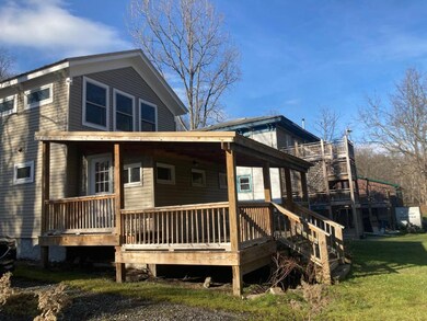 Relax on this recently added, large back porch whi