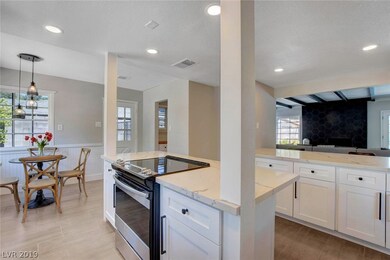 New stone countertops, island, flooring, paint and