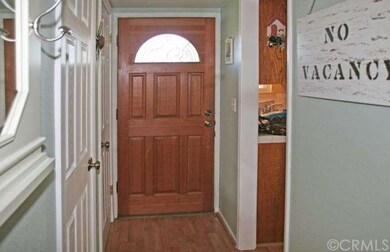 Custom entry door leads to the front corner sink k