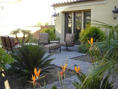 Lovely courtyard with seating greets you as you wa