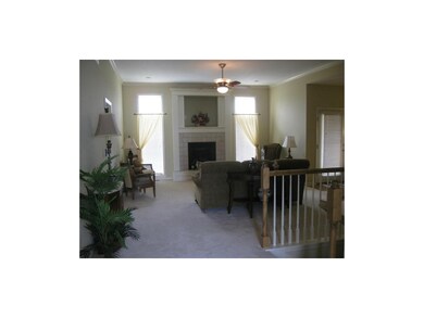 View of living room from entry.  Steps to the righ