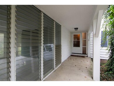 The charming front porch is perfect for welcoming 