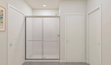 Glass shower enclosure in primary bath
