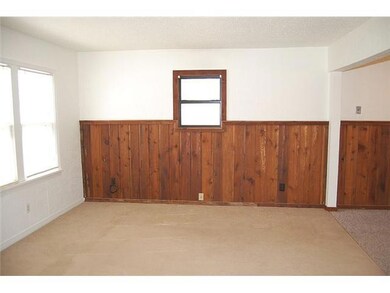 Living Room. Living Room also has wood siding for 