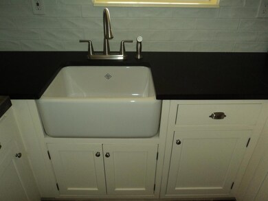 Ceramic kitchen sink, with new fixtures, granite counters and more!