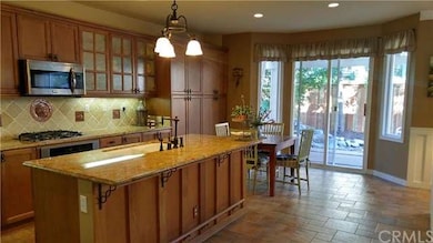Gourmet kitchen with beautiful opaque glass cabine
