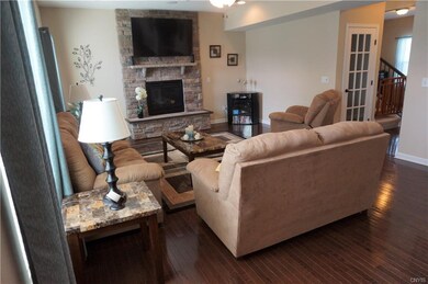 Note the sumptuous hardwoods that gleam throughout