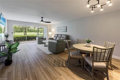 Dining space with ceiling fan and wood-type floori