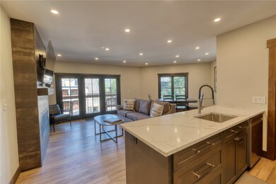 Kitchen featuring tasteful backsplash, lvp floorin