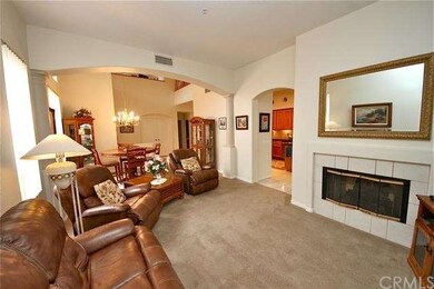 Dual-sided fireplace shared with the family room