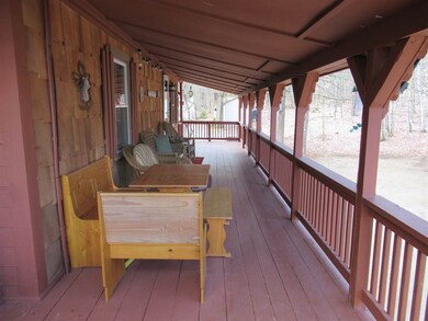 This long covered porch is a great place for enjoy