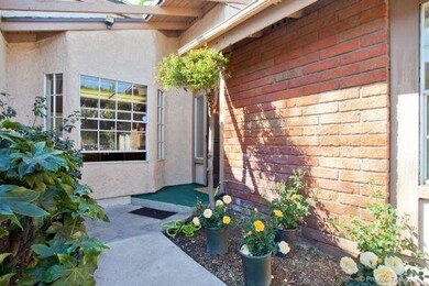 Walk way to the private front door.  Enjoy plantin