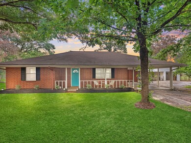 This image shows a single-story brick home with a