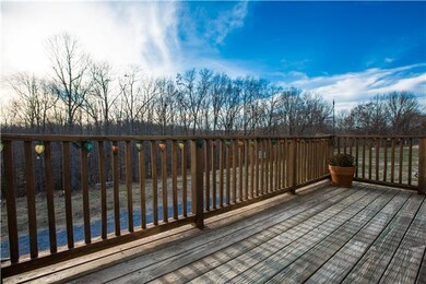 A view of the deck on the back of the house.