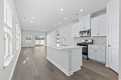 Kitchen featuring stainless steel appliances, sink