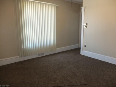 Dining room with new carpet.