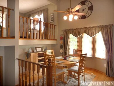 Dramatically vaulted dining room with bayed window