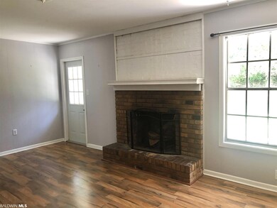 Den with fireplace off the Kitchen