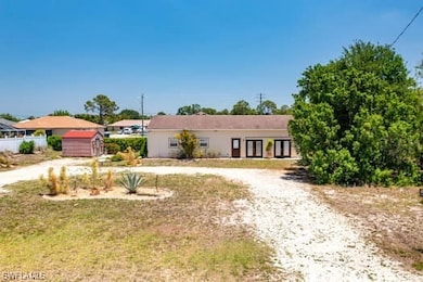 914 Albert Ave, Lehigh Acres, FL 33971 - photo 2