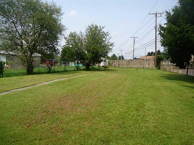 Exterior Back. Level Yard
