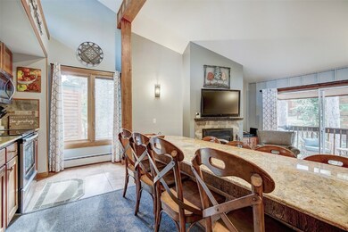 Tiled dining area with a baseboard radiator, lofte