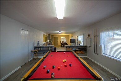 Recreation room with natural light and TV