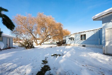 Area between home and garage/shop