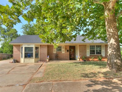 Ranch-style home with a front yard