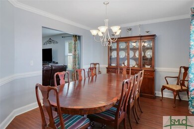 Formal dining room big enough for the family for t