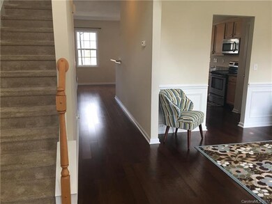 Foyer at front entrance. Formal dining room on rig