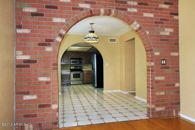 Family Room looking to Dining & Kitchen