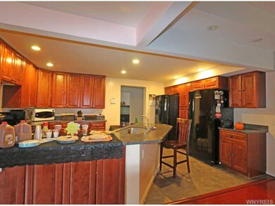 Kitchen. Tile floors in the kitchen and baths, no 