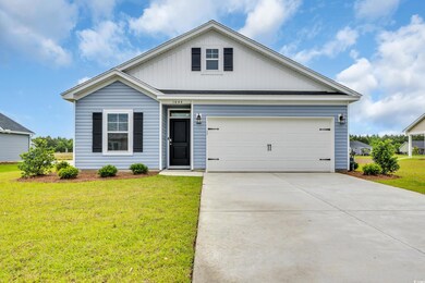 View of front of home featuring a front lawn and d