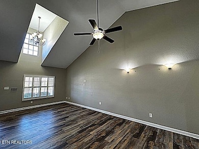 LIVING ROOM WITH VAULTED CEILINGS