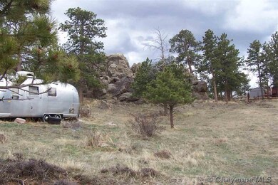 The camper trailer appears to be encrouching on th