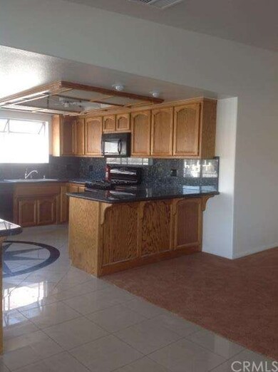 Beautiful open concept kitchen with granite counte