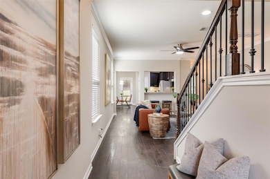 Inside, the entire interior has been freshly painted, creating a crisp, move-in-ready atmosphere that complements the home’s open floor plan. 