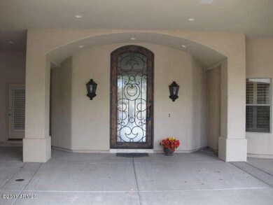 IRON AND GLASS FRONT ENTRY DOOR