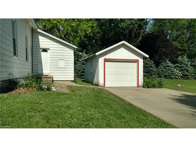 1 car garage.  The yard is very private with trees