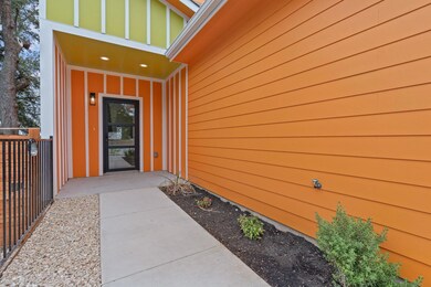 Doorway to property with fence
