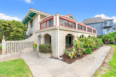 View of front of house featuring brick siding