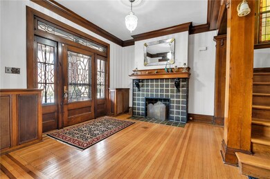 Entry. Leaded glass door and sidelights.