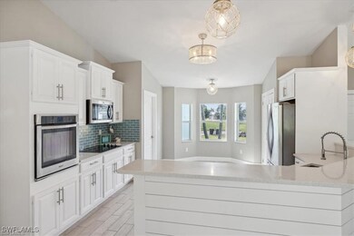 Kitchen featuring appliances with stainless steel