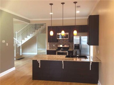 Kitchen. Kitchen is the centerpiece of the open fl