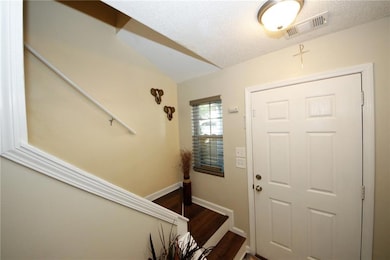 Entrance foyer with a textured ceiling