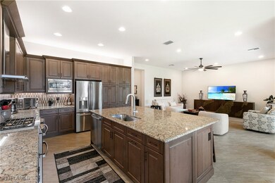 Kitchen featuring appliances with stainless steel